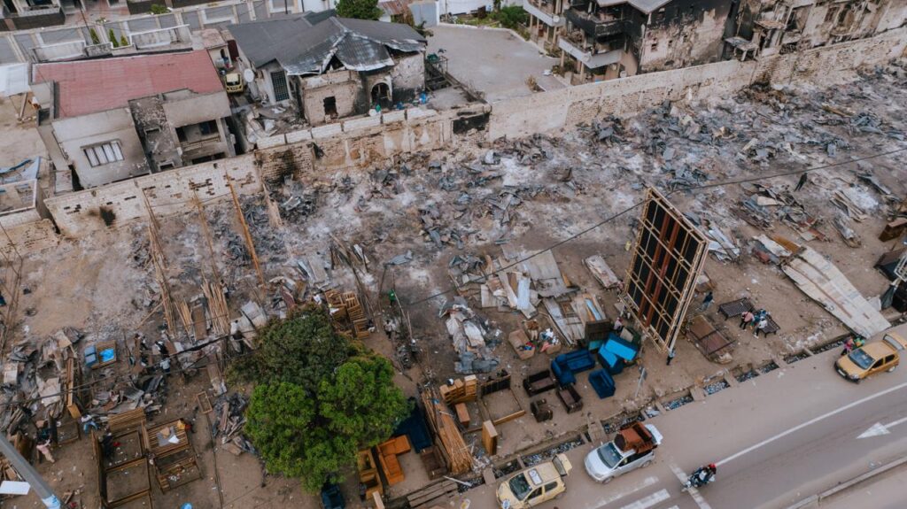 1001452890-1024x575 Retro-Activation du procole d'urgence lié à l'incendie sur le site artisanal de Delvaux : la Première Ministre exige des solutions durables en faveur des victimes